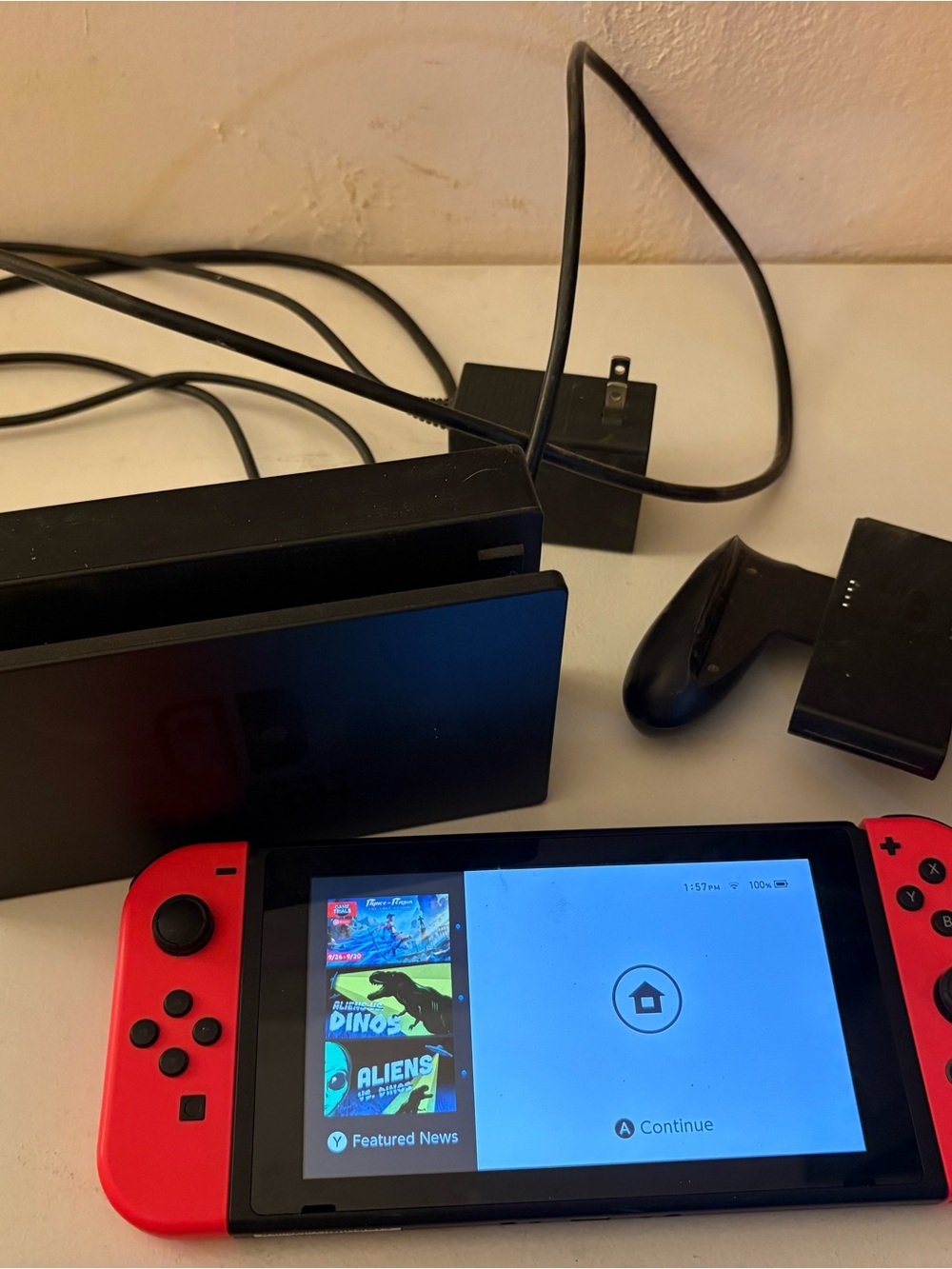 Nintendo Switch with Neon Red Joy‑Con Controllers and Dock